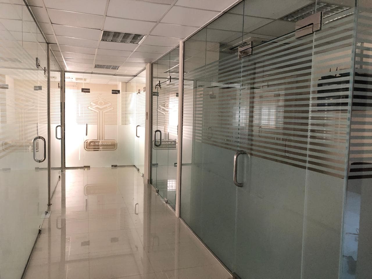 Glass and aluminium office partition corridor