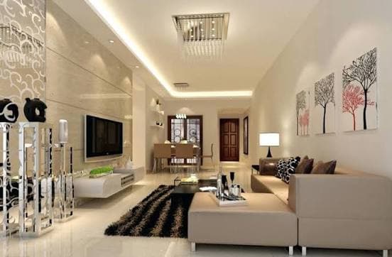 Cream-toned living room with wall-mounted television